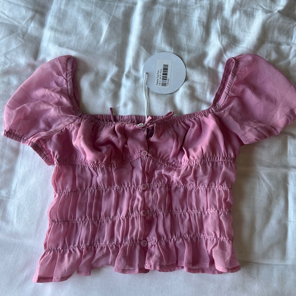Princess Polly pink crop top with ruffles